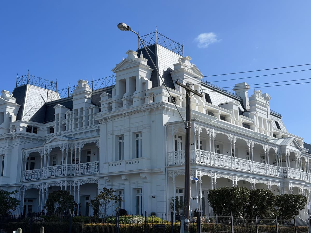 Beaumaris Hotel front elevation with slate mansard roofs and iron cresting